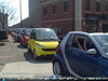 12 smart cars all in a row